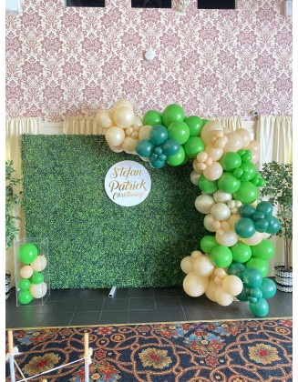 Green Wall with Balloon Arch